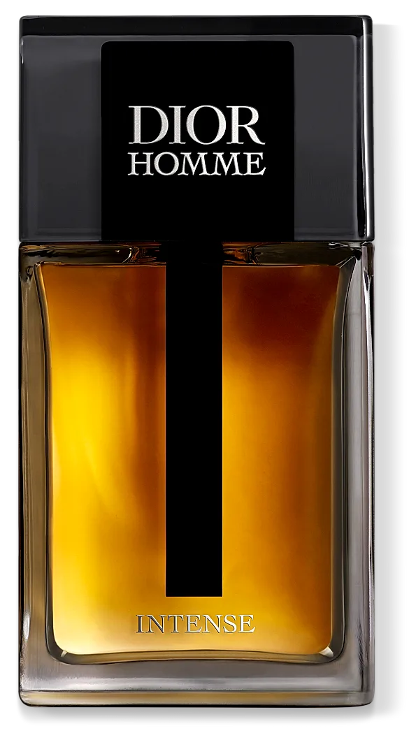 The Dior Homme Intense flacon — a slab of amber glass under a graphite-black shoulder, the silver DIOR HOMME serif holding the last of the light while the juice glows like late honey