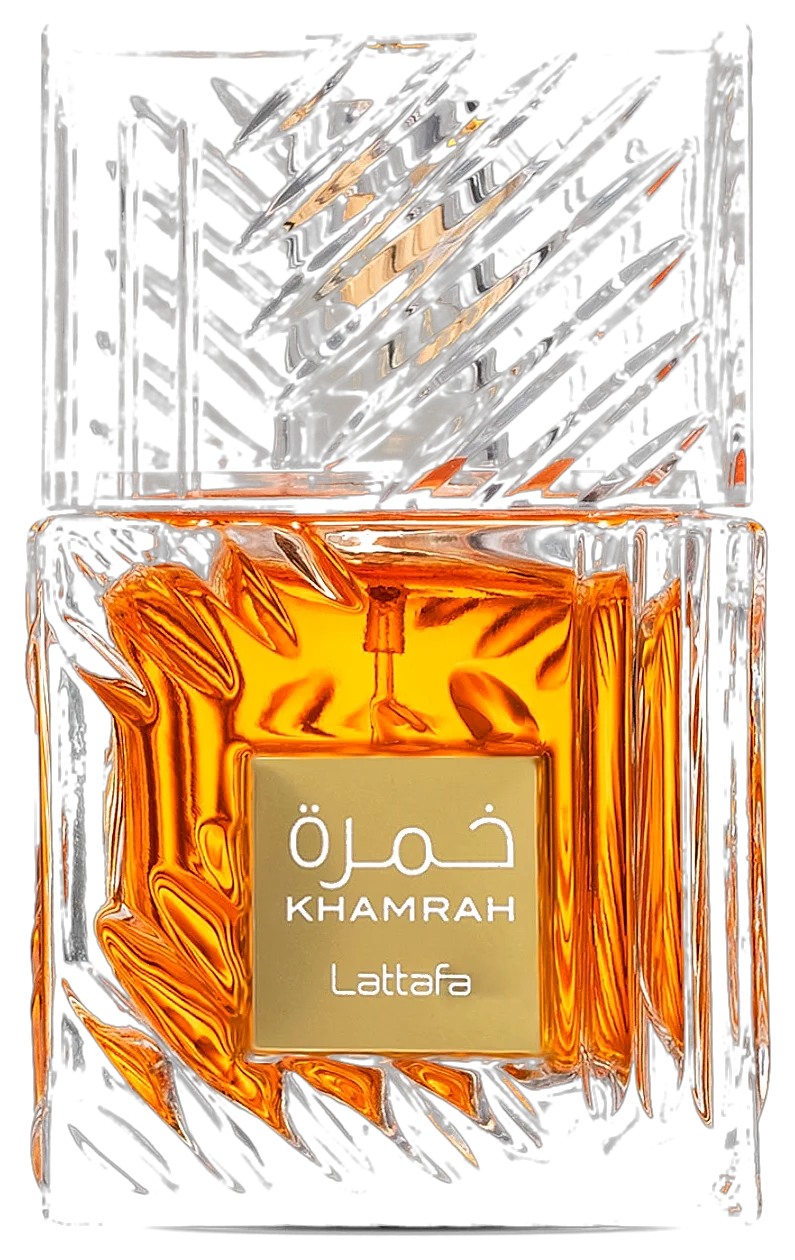 The Khamrah flacon — a whisky tumbler of cut glass, its slashed facets scattering light over cognac-dark juice, a small gold plate lettered in Arabic at its heart